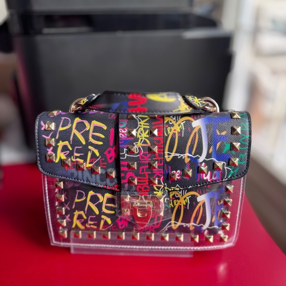 NWoT Graffiti Clear 2pc Crossbody Clutch w/ Studs & Removable Zippered Pouch - Picture 1 of 11